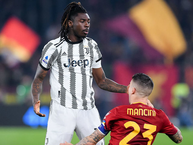 Moise Kean of Juventus FC argues with Gianluca Mancini of AS Roma during the Serie A match between AS Roma and Juventus FC at Stadio Olimpico on March 05 2023 in Rome, Italy