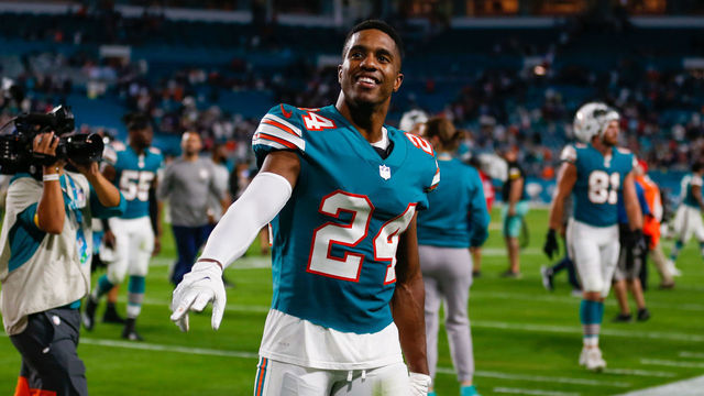 MIAMI GARDENS, FL - JANUARY 09: Miami Dolphins cornerback Byron Jones (24) walks off the field following the game between the New England Patriots and the Miami Dolphins on January 9, 2022 at Hard Rock Stadium in Miami Gardens, Fl.