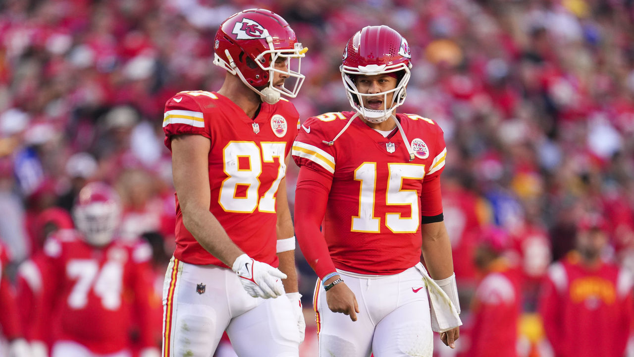 KANSAS CITY, MO - OCTOBER 16: Travis Kelce #87 of the Kansas City Chiefs speaks with Patrick Mahomes #15 against the Buffalo Bills at GEHA Field at Arrowhead Stadium on October 16, 2022 in Kansas City, Missouri.