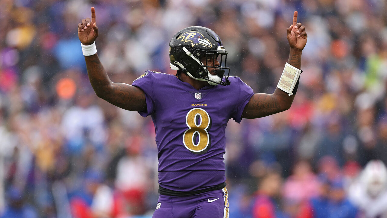 BALTIMORE, MARYLAND - OCTOBER 02: Quarterback Lamar Jackson #8 of the Baltimore Ravens celebrates after teammate J.K. Dobbins #27 scored a touchdown in the first quarter against the Buffalo Bills at M&T Bank Stadium on October 02, 2022 in Baltimore, Maryland.