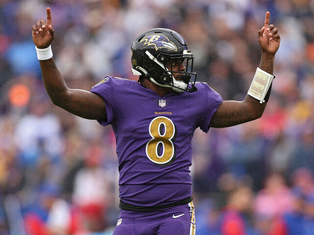 BALTIMORE, MARYLAND - OCTOBER 02: Quarterback Lamar Jackson #8 of the Baltimore Ravens celebrates after teammate J.K. Dobbins #27 scored a touchdown in the first quarter against the Buffalo Bills at M&T Bank Stadium on October 02, 2022 in Baltimore, Maryland.
