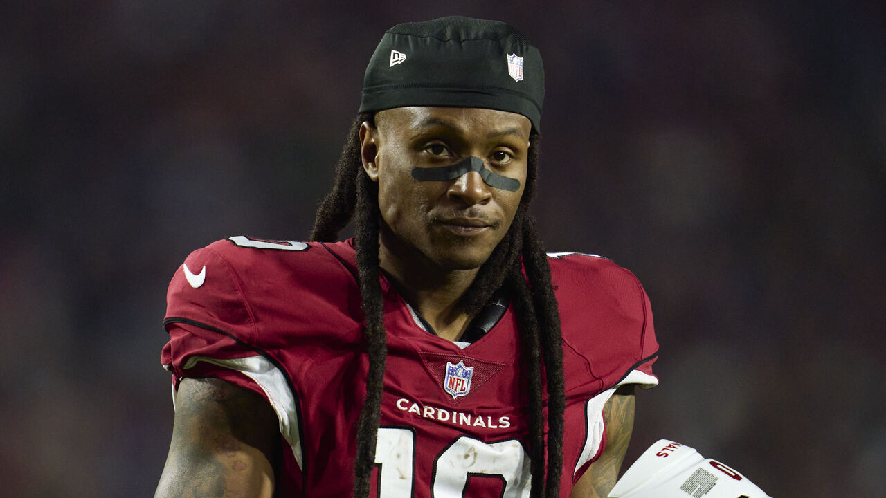 GLENDALE, AZ - DECEMBER 12: DeAndre Hopkins #10 of the Arizona Cardinals looks towards the sideline against the New England Patriots during the second half at State Farm Stadium on December 12, 2022 in Glendale, Arizona.