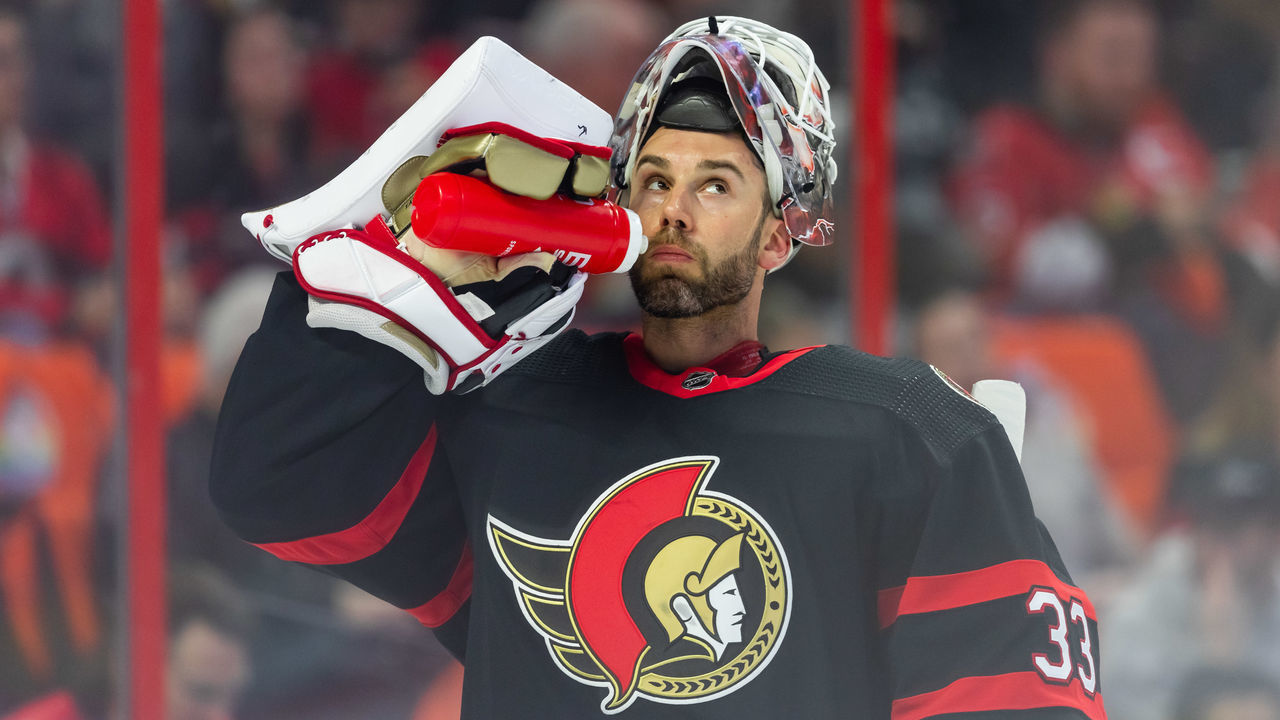 OTTAWA, ON - MARCH 04: Ottawa Senators Goalie Cam Talbot (33) takes a drink after a whistle during first period National Hockey League action between the Columbus Blue Jackets and Ottawa Senators on March 4, 2023, at Canadian Tire Centre in Ottawa, ON, Canada.