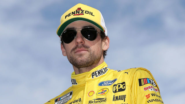 LAS VEGAS, NEVADA - MARCH 05: Ryan Blaney, driver of the #12 Menards/Pennzoil Ford, walks onstage during driver intros prior to the NASCAR Cup Series Pennzoil 400 at Las Vegas Motor Speedway on March 05, 2023 in Las Vegas, Nevada.