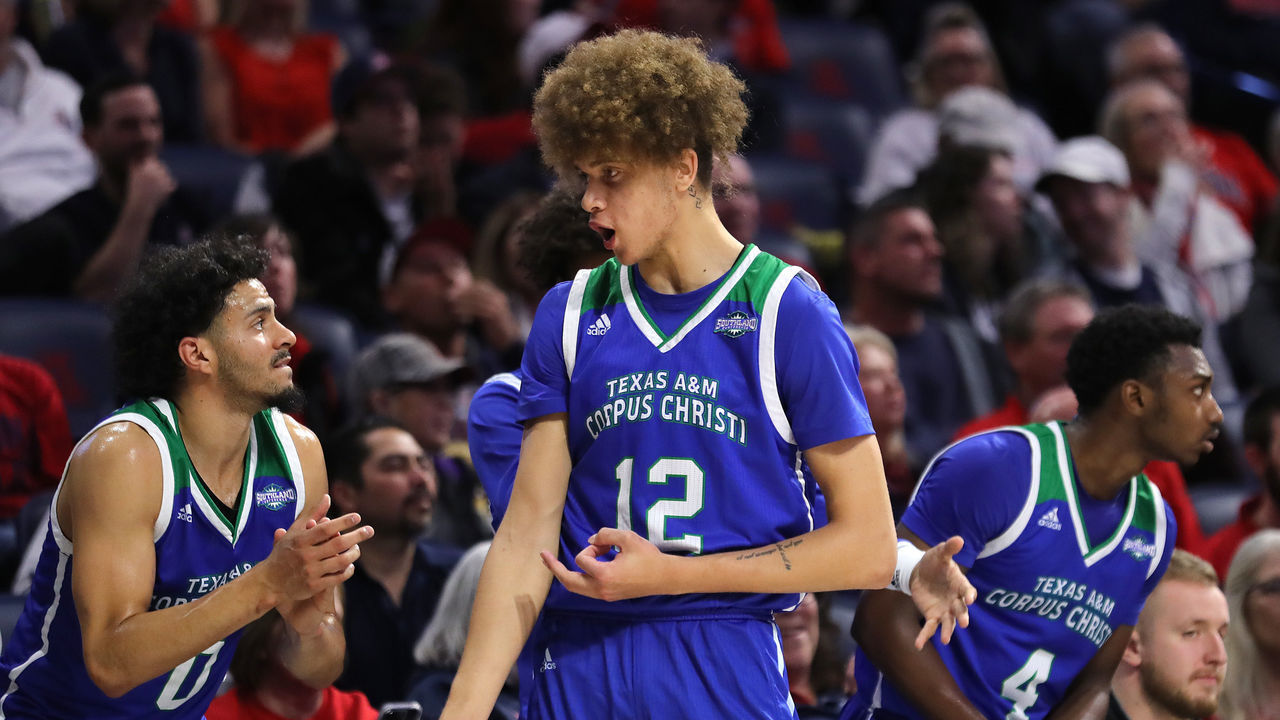 TUCSON, ARIZONA - DECEMBER 13: Forward Owen Dease #12 of the Texas A&M-Corpus Christi Islanders celebrates a three-pointer during the second half of the NCAA basketball game against the Arizona Wildcats at McKale Center on December 13, 2022 in Tucson, Arizona.