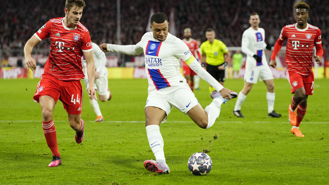 Kylian Mbappe centre-forward of PSG and France shooting to goal during the UEFA Champions League round of 16 leg two match between FC Bayern München and Paris Saint-Germain at Allianz Arena on March 8, 2023 in Munich, Germany.