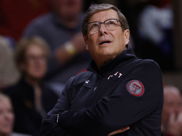 AMES, IA - JANUARY 10: Head coach Mark Adams of the Texas Tech Red Raiders coaches from the bench in the first half of play at Hilton Coliseum on January 10, 2023 in Ames, Iowa. The Iowa State Cyclones won 84-50 over the Texas Tech Red Raiders.