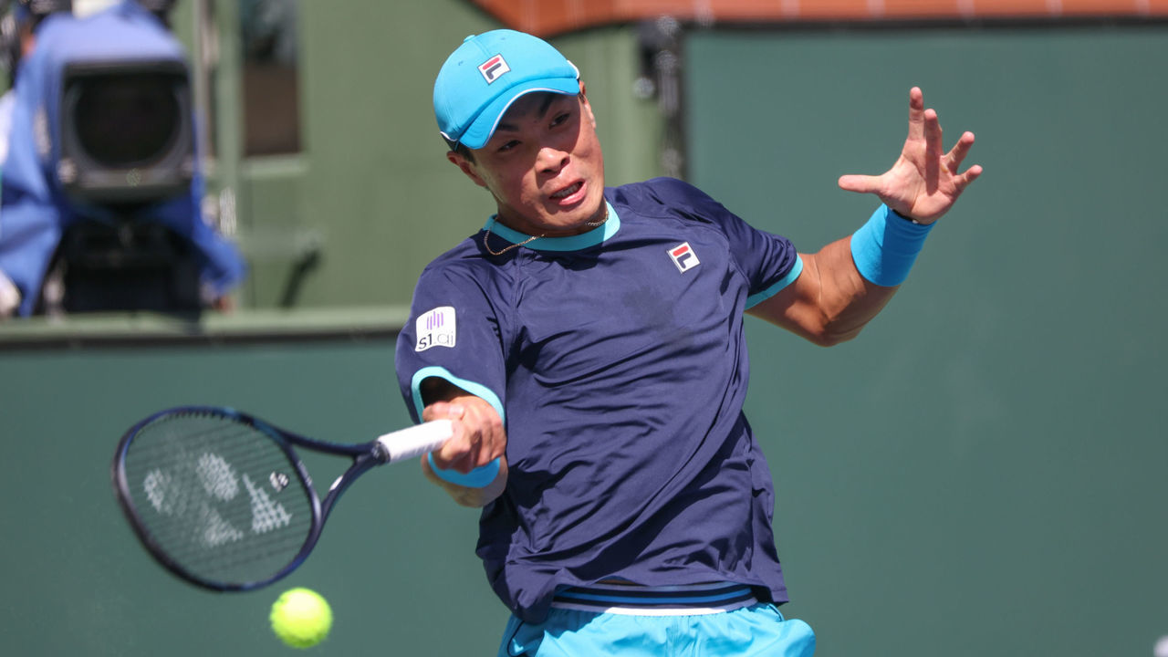 INDIAN WELLS, CA - MARCH 08: Brandon Nakashima (USA) hits a forehand during the BNP Paribas Open on March 8, 2023 at the Indian Wells Tennis Garden in Indian Wells, CA.