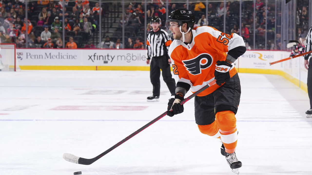 PHILADELPHIA, PA - SEPTEMBER 28: Tyson Foerster #52 of the Philadelphia Flyers controls the puck against the Washington Capitals during the preseason game at the Wells Fargo Center on September 28, 2022 in Philadelphia, Pennsylvania.