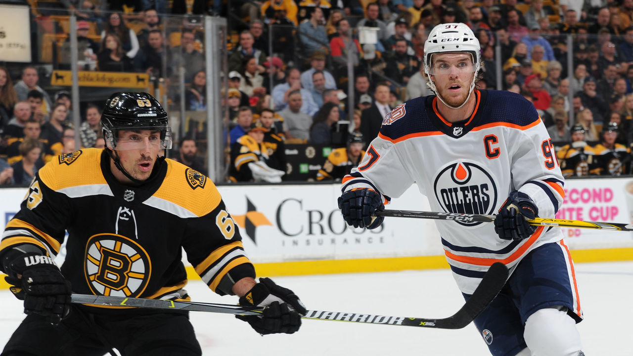 BOSTON, MA - OCTOBER 11: Brad Marchand #63 of the Boston Bruins against Connor McDavid #97 of the Edmonton Oilers at the TD Garden on October 11, 2018 in Boston, Massachusetts.