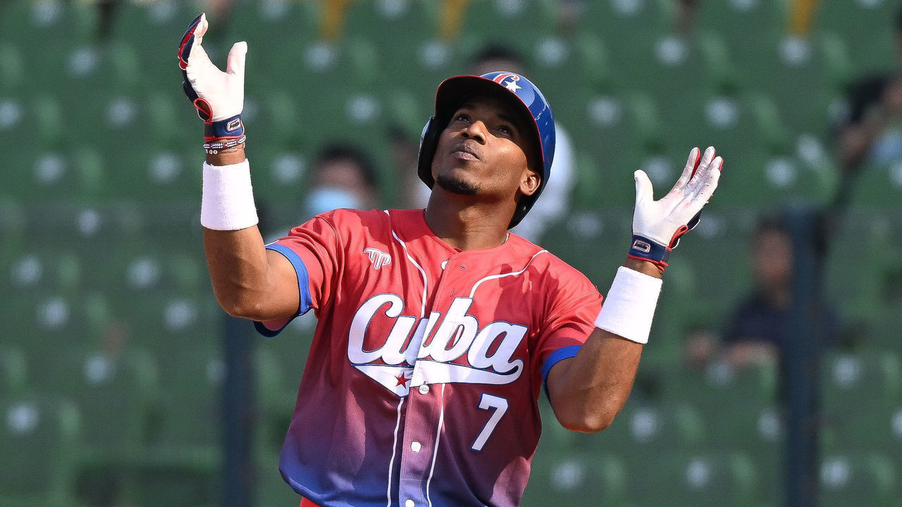 TAICHUNG, TAIWAN - MARCH 10: Yoelkis Guibert #7 of Team Cuba hits a single at the top of the 7th inning during the World Baseball Classic Pool A game between Cuba and Panama at Taichung Intercontinental Baseball Stadium on March 10, 2023 in Taichung, Taiwan.