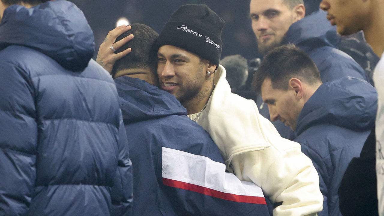 PARIS, FRANCE - MARCH 3: Kylian Mbappe of PSG celebrates its 201st goal for PSG - becoming PSG top scorer in history, surpassing Edison Cavani and his 200 goals - during a trophy ceremony - here with Neymar Jr on crutches - following the Ligue 1 match between Paris Saint-Germain (PSG) and FC Nantes at Parc des Princes stadium on March 3, 2023 in Paris, France.