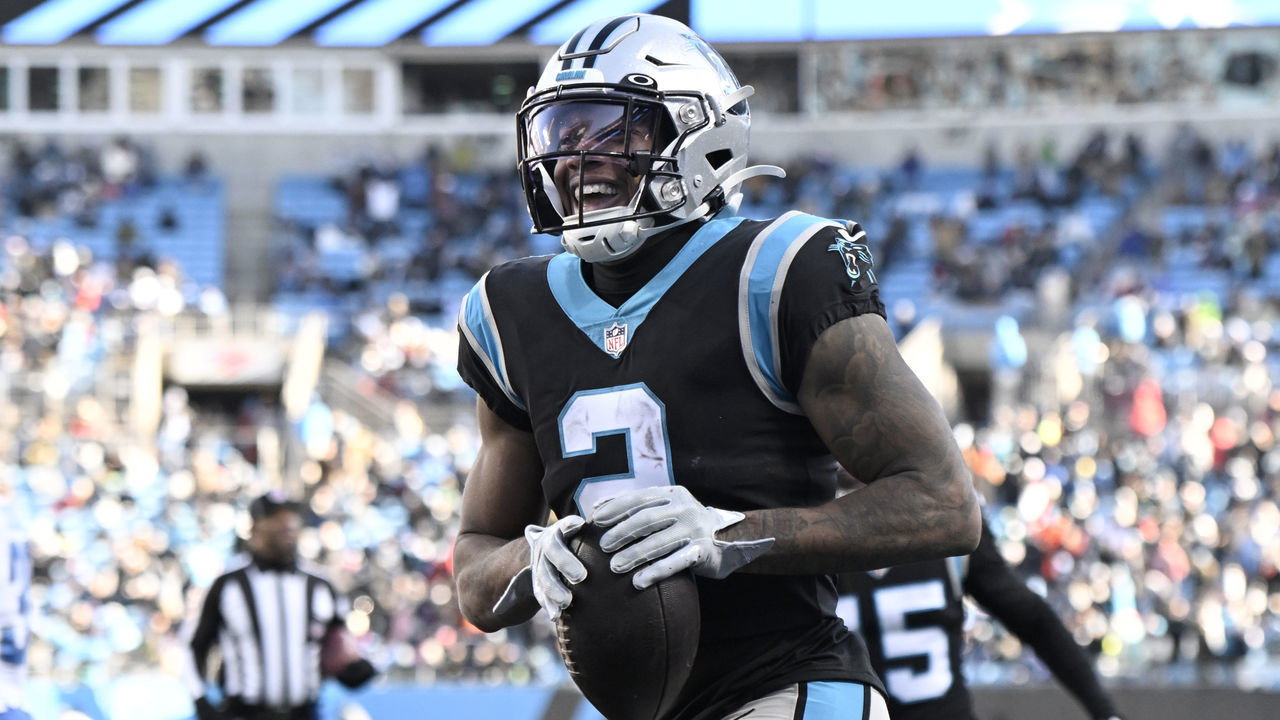 CHARLOTTE, NORTH CAROLINA - DECEMBER 24: DJ Moore #2 of the Carolina Panthers celebrates after scoring a touchdown against the Detroit Lions during the third quarter of the game at Bank of America Stadium on December 24, 2022 in Charlotte, North Carolina.