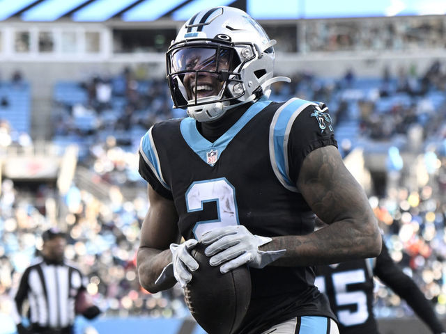CHARLOTTE, NORTH CAROLINA - DECEMBER 24: DJ Moore #2 of the Carolina Panthers celebrates after scoring a touchdown against the Detroit Lions during the third quarter of the game at Bank of America Stadium on December 24, 2022 in Charlotte, North Carolina.