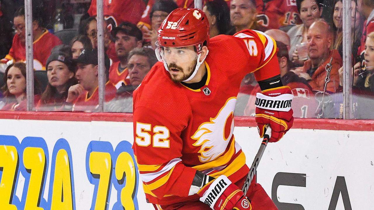 CALGARY, CANADA - FEBRUARY 18: MacKenzie Weegar #52 of the Calgary Flames in action against the New York Rangers during an NHL game at Scotiabank Saddledome on February 18, 2023 in Calgary, Alberta, Canada. The Flames defeated the Rangers 3-2 in overtime.