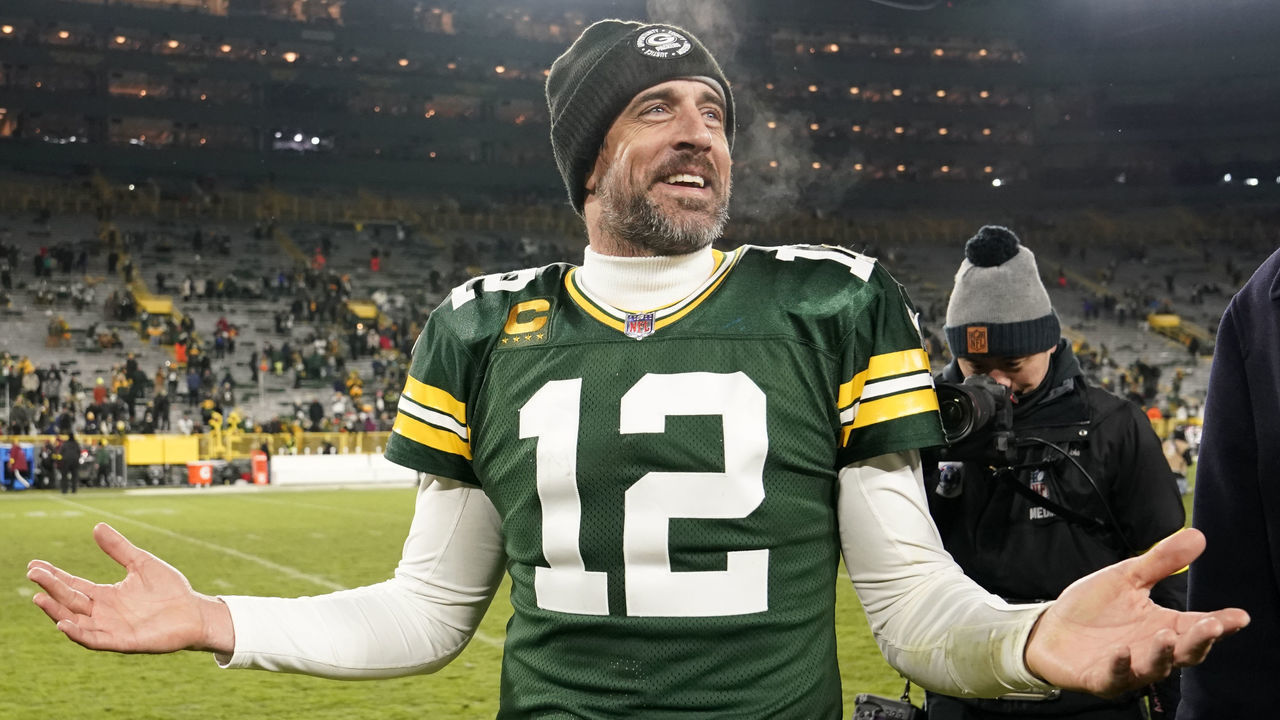 GREEN BAY, WISCONSIN - DECEMBER 19: Aaron Rodgers #12 of the Green Bay Packers reacts after defeating the Los Angeles Rams 24-12 at Lambeau Field on December 19, 2022 in Green Bay, Wisconsin.