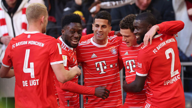 MUNICH, GERMANY - MARCH 11: Benjamin Pavard of FC Bayern Munich celebrates with teammates after scoring the team's second goal during the Bundesliga match between FC Bayern Muenchen and FC Augsburg at Allianz Arena on March 11, 2023 in Munich, Germany.