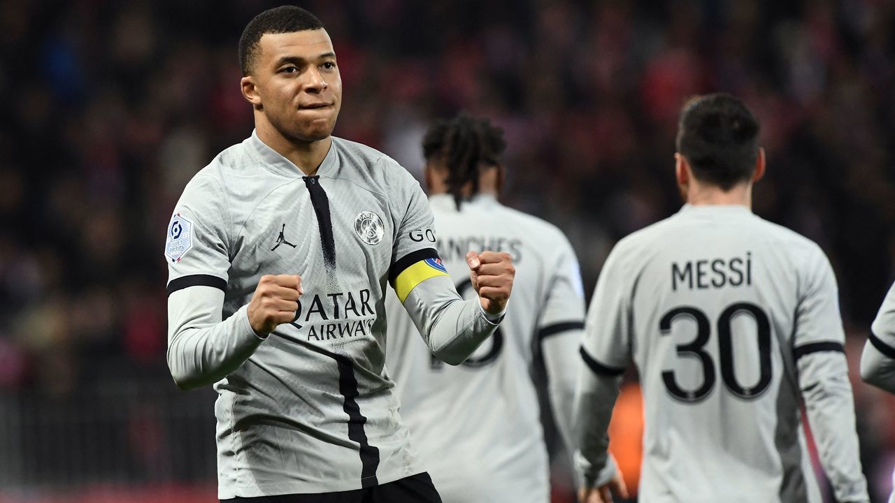 Paris Saint-Germain's French forward Kylian Mbappe celebrates after scoring a goal during the French L1 football match between Stade Brestois 29 (Brest) and Paris Saint-Germain FC at Stade Francis-Le Ble in Brest, western France on March 11, 2023.