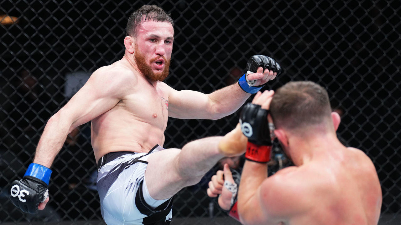 LAS VEGAS, NEVADA - MARCH 11: (L-R) Merab Dvalishvili of Georgia kicks Petr Yan of Russia in a bantamweight fight during the UFC Fight Night event at The Theater at Virgin Hotels Las Vegas on March 11, 2023 in Las Vegas, Nevada.