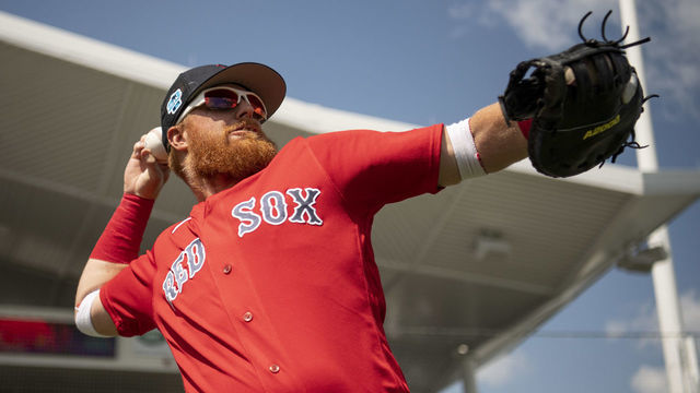 FORT MYERS, FL - MARCH 6: Justin Turner #2 of the Boston Red Sox throws before a Grapefruit League game against the Detroit Tigers on March 6, 2023 at JetBlue Park at Fenway South in Fort Myers, Florida.