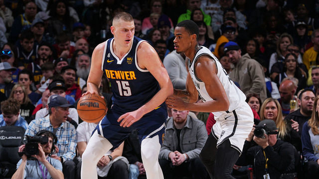 DENVER, CO - MARCH 12: Nikola Jokic #15 of the Denver Nuggets dribbles the ball during the game against the Brooklyn Nets on March 12, 2023 at the Ball Arena in Denver, Colorado. NOTE TO USER: User expressly acknowledges and agrees that, by downloading and/or using this Photograph, user is consenting to the terms and conditions of the Getty Images License Agreement. Mandatory Copyright Notice: Copyright 2023 NBAE