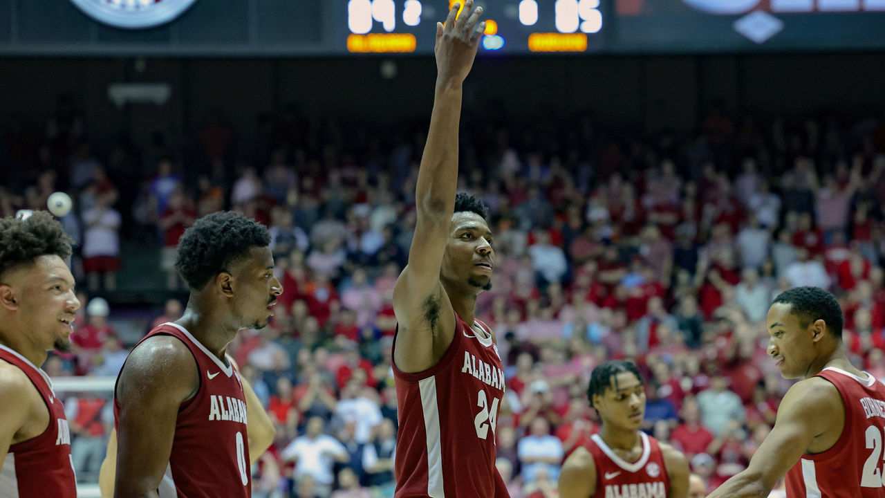 TUSCALOOSA, AL - MARCH 1: Brandon Miller #24 of the Alabama Crimson Tide fires up the home crowd during an overtime time out against the Auburn Tigers at Coleman Coliseum on March 1, 2023 in Tuscaloosa, Alabama.