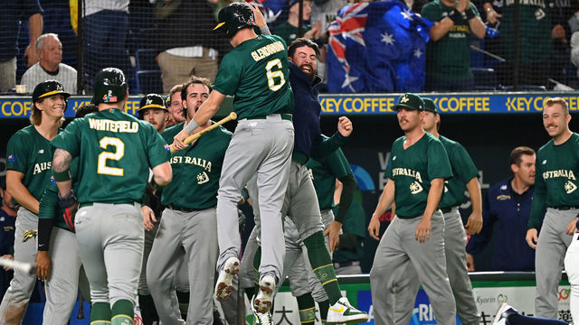 TOKYO, JAPAN - MARCH 13: Robbie Glendinning #6 and Aaron Whitefield #2 of Australia celebrate with teammates after scoring runs by the two-run double of Logan Wade #4 to make it 3-1 in the seventh inning during the World Baseball Classic Pool B game between Australia and Czech Republic at Tokyo Dome on March 13, 2023 in Tokyo, Japan.