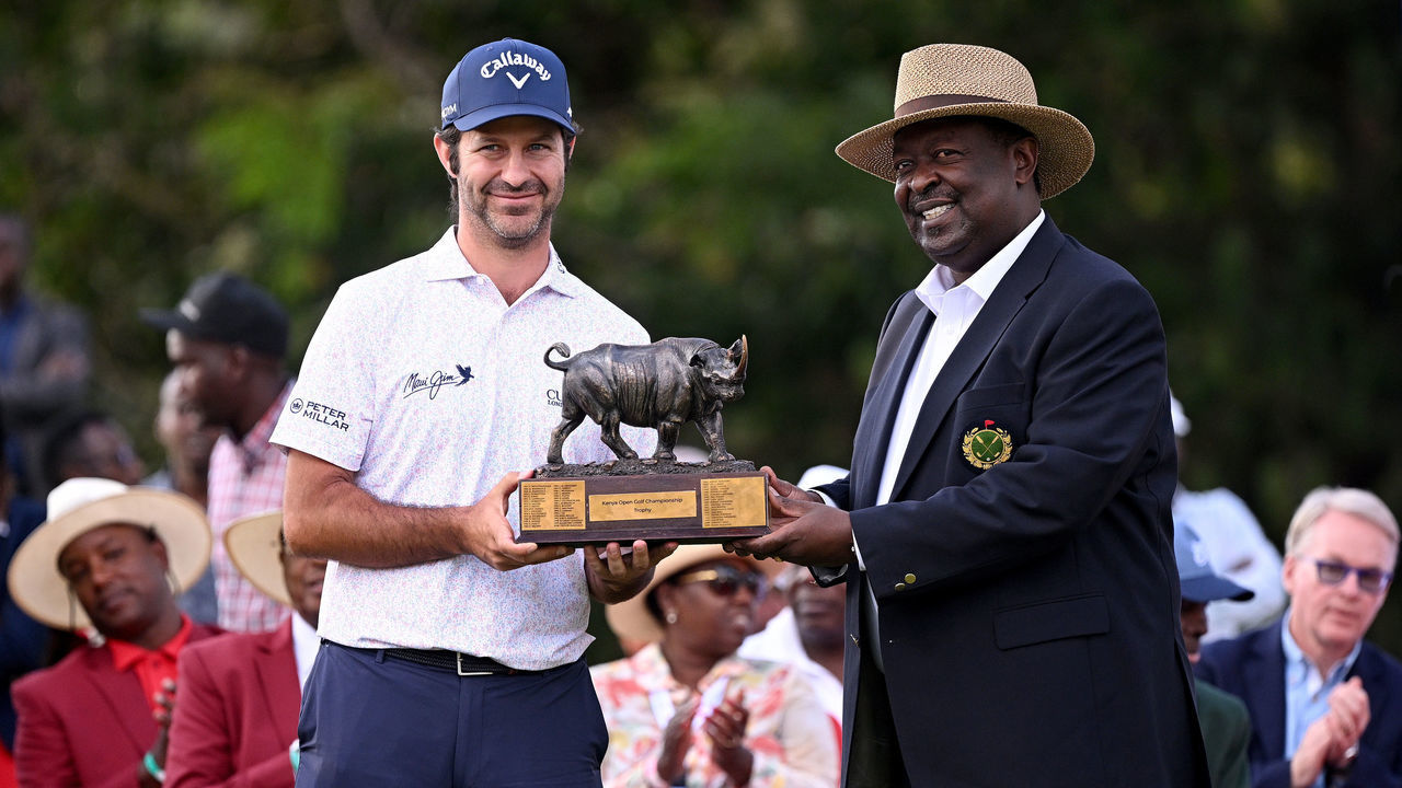 NAIROBI, KENYA - MARCH 12: Jorge Campillo of Spain is presented with the winners trophy by The Prime Cabinet Secretary, Hon Musalia Mudavadi after the final round of the Magical Kenya Open Presented by Absa at Muthaiga Golf Club on March 12, 2023 in Kenya.