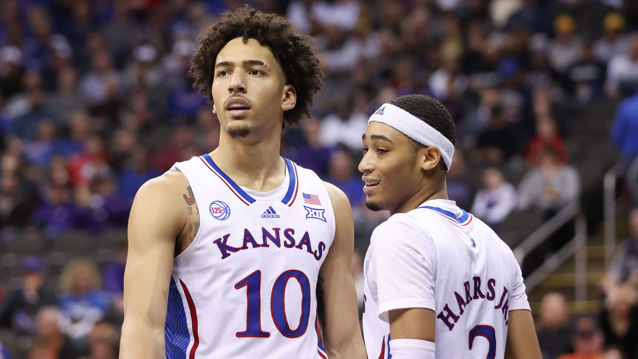 KANSAS CITY, MO - MARCH 09: Kansas Jayhawks forward Jalen Wilson (10) and guard Dajuan Harris Jr. (3) in the second half of a Big 12 Tournament quarterfinal basketball game between the West Virginia Mountaineers and the Kansas Jayhawks on March 9, 2023 at T-Mobile Center in Kansas City, MO.