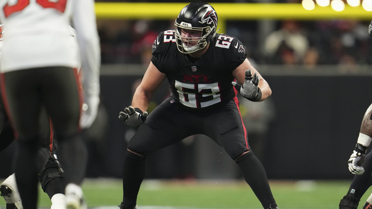 ATLANTA, GA - JANUARY 08: Chris Lindstrom #63 of the Atlanta Falcons defends against the Tampa Bay Buccaneers at Mercedes-Benz Stadium on January 8, 2023 in Atlanta, Georgia.