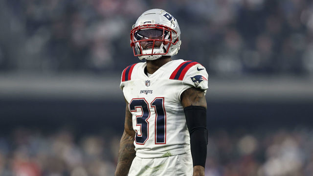 LAS VEGAS, NEVADA - DECEMBER 18: Jonathan Jones #31 of the New England Patriots looks on during an NFL football game between the Las Vegas Raiders and the New England Patriots at Allegiant Stadium on December 18, 2022 in Las Vegas, Nevada.