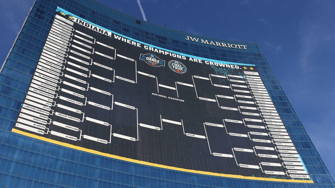 INDIANAPOLIS, INDIANA - APRIL 02: Exterior picture of the JW Marriott Hotel which has the entire bracket of the NCAA Men's Basketball Tournament hanging on its building on April 03, 2021 in Indianapolis, Indiana.