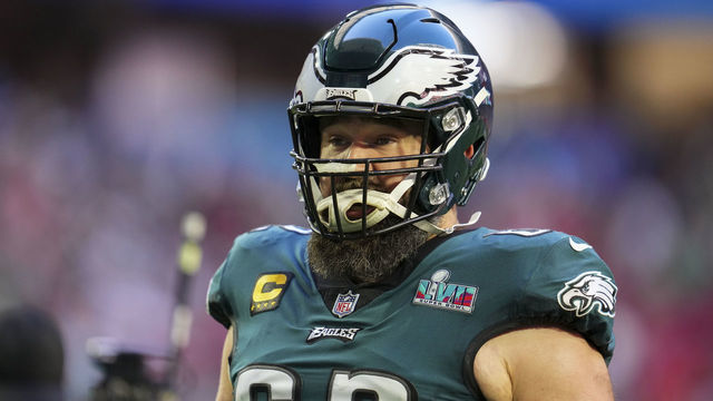 GLENDALE, AZ - FEBRUARY 12: Jason Kelce #62 of the Philadelphia Eagles speaks with teammates against the Kansas City Chiefs after Super Bowl LVII at State Farm Stadium on February 12, 2023 in Glendale, Arizona. The Chiefs defeated the Eagles 38-35.