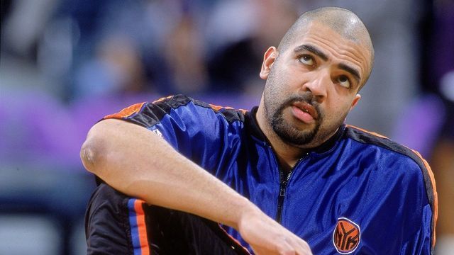 23 Jan 2001: Felton Spencer #50 of the New York Knicks stretches out on the court before the game against the Milwaukee Bucks at the Bradley Center in Milwaukee, Wisconsin. The Bucks won 105-91. NOTE TO USER: It is expressly understood that the only rights Allsport are offering to license in this Photograph are one-time, non-exclusive editorial rights. No advertising or commercial uses of any kind may be made of Allsport photos. User acknowledges that it is aware that Allsport is an editorial sports agency and that NO RELEASES OF ANY TYPE ARE OBTAINED from the subjects contained in the photographs.Mandatory Credit: Jonathan Daniel/Allsport