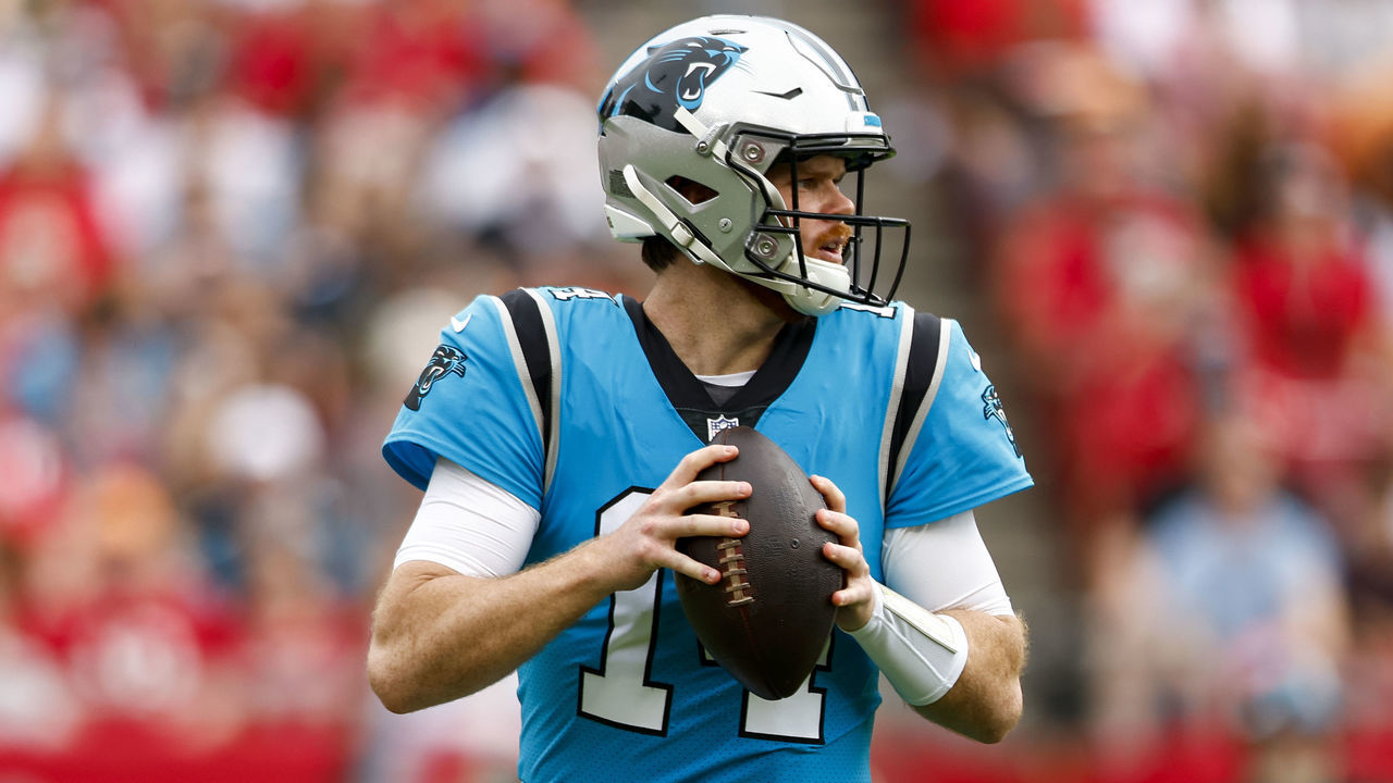 TAMPA, FL - JANUARY 1: Sam Darnold #14 of the Carolina Panthers drops back to pass during the first quarter of an NFL football game against the Tampa Bay Buccaneers at Raymond James Stadium on January 1, 2023 in Tampa, Florida.