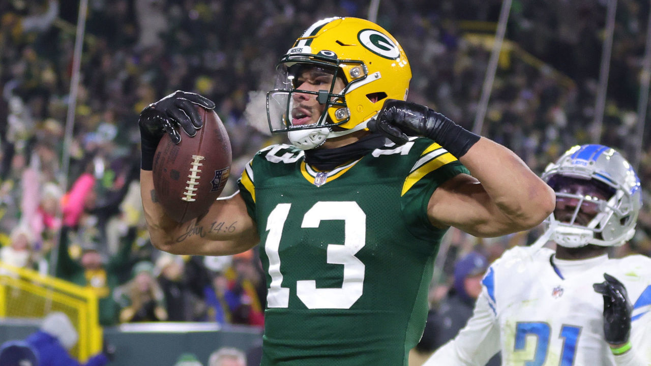 GREEN BAY, WISCONSIN - JANUARY 08: Allen Lazard #13 of the Green Bay Packers celebrates after a touchdown during the third quarter against the Detroit Lions at Lambeau Field on January 08, 2023 in Green Bay, Wisconsin.