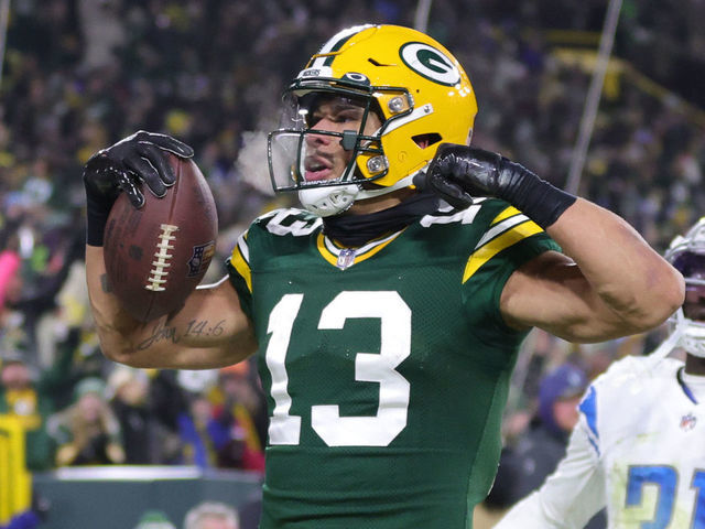 GREEN BAY, WISCONSIN - JANUARY 08: Allen Lazard #13 of the Green Bay Packers celebrates after a touchdown during the third quarter against the Detroit Lions at Lambeau Field on January 08, 2023 in Green Bay, Wisconsin.