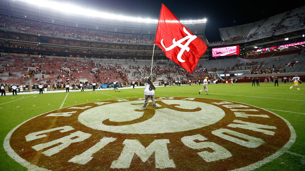 TUSCALOOSA, AL - SEPTEMBER 13: Big Al, mascot of the Alabama Crimson Tide, waves the flag after their 52-12 win over the Southern Miss Golden Eagles at Bryant-Denny Stadium on September 13, 2014 in Tuscaloosa, Alabama.