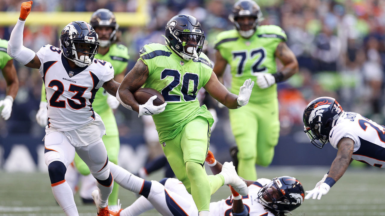 SEATTLE, WASHINGTON - SEPTEMBER 12: Rashaad Penny #20 of the Seattle Seahawks carries the ball during the second quarter against the Denver Broncos at Lumen Field on September 12, 2022 in Seattle, Washington.