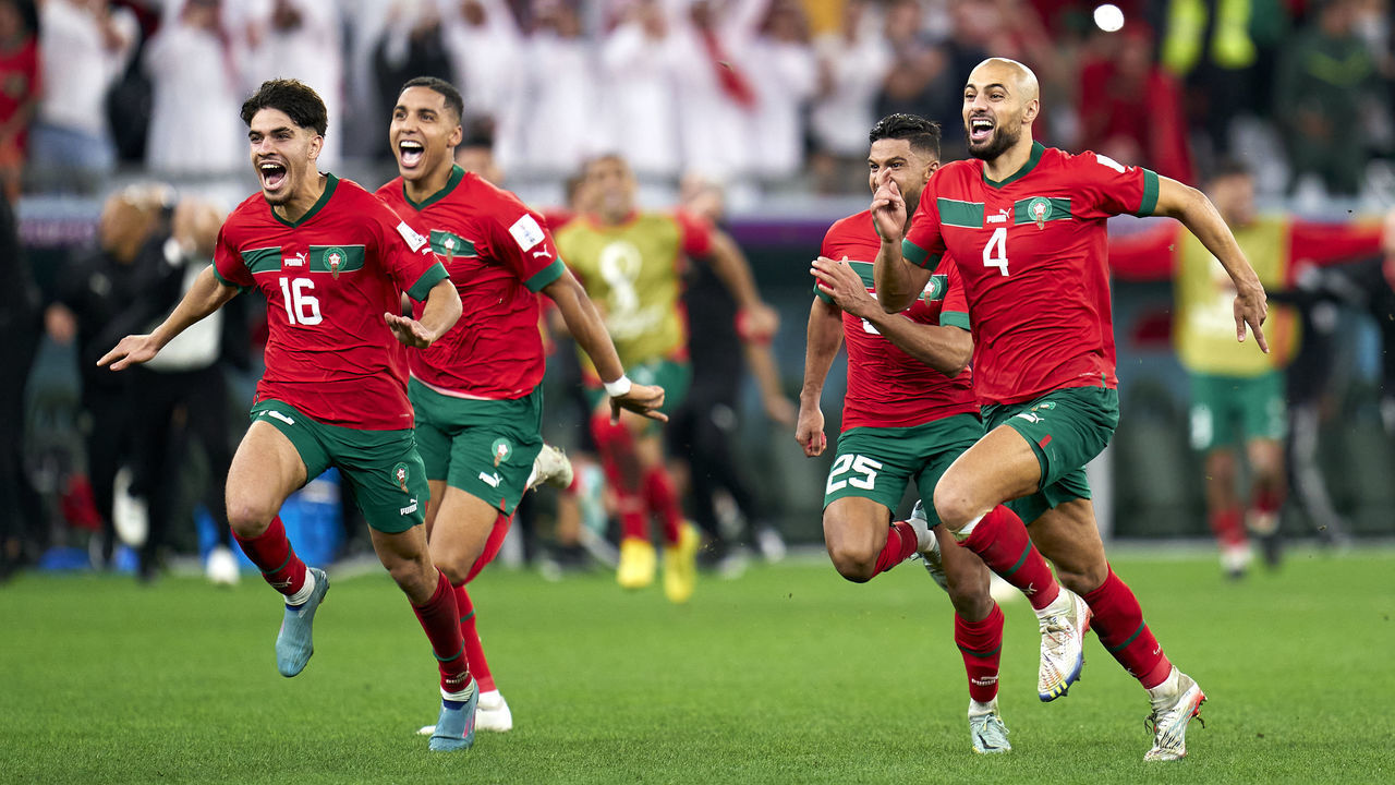 AL RAYYAN, QATAR - DECEMBER 06: Sofyan Amrabat and players of Morocco celebrate after their win in the penalty shoot out during the FIFA World Cup Qatar 2022 Round of 16 match between Morocco and Spain at Education City Stadium on December 06, 2022 in Al Rayyan, Qatar.