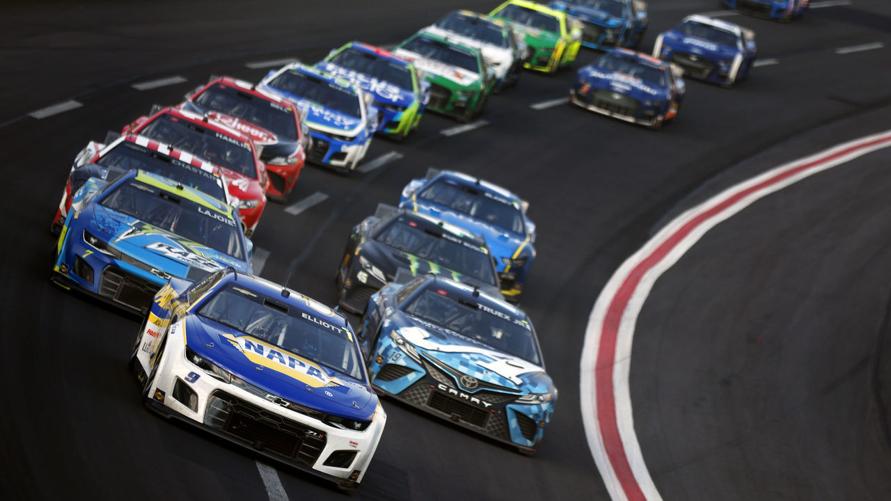 HAMPTON, GEORGIA - JULY 10: Chase Elliott, driver of the #9 NAPA Auto Parts Chevrolet, leads the field during the NASCAR Cup Series Quaker State 400 at Atlanta Motor Speedway on July 10, 2022 in Hampton, Georgia.