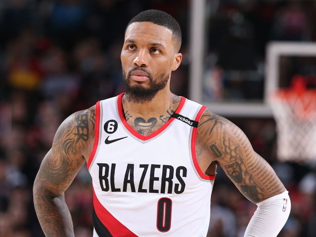 PORTLAND, OR - FEBRUARY 6: Damian Lillard #0 of the Portland Trail Blazers looks on during the game against the Milwaukee Bucks on February 6, 2023 at the Moda Center Arena in Portland, Oregon. Mandatory Copyright Notice: Copyright 2022 NBAE