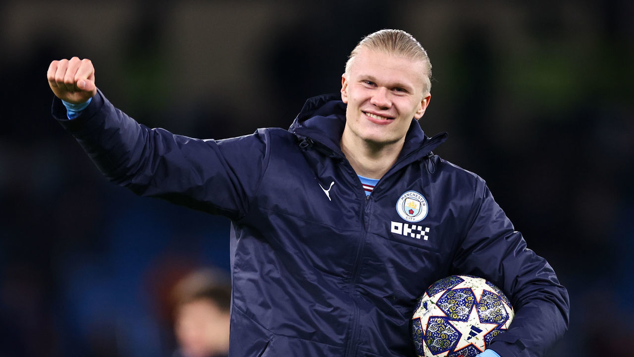MANCHESTER, ENGLAND - MARCH 14: Erling Haaland of Manchester City celebrates with the match ball at full time during the UEFA Champions League round of 16 leg two match between Manchester City and RB Leipzig at Etihad Stadium on March 14, 2023 in Manchester, United Kingdom.