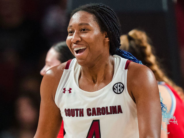 COLUMBIA, SOUTH CAROLINA - DECEMBER 11: Aliyah Boston #4 of the South Carolina Gamecocks reacts during their game against the Liberty Lady Flames at Colonial Life Arena on December 11, 2022 in Columbia, South Carolina.