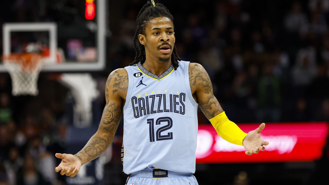 MINNEAPOLIS, MN - NOVEMBER 30: Ja Morant #12 of the Memphis Grizzlies reacts to a call on the floor in the second quarter of the game against the Memphis Grizzlies at Target Center on November 30, 2022 in Minneapolis, Minnesota.
