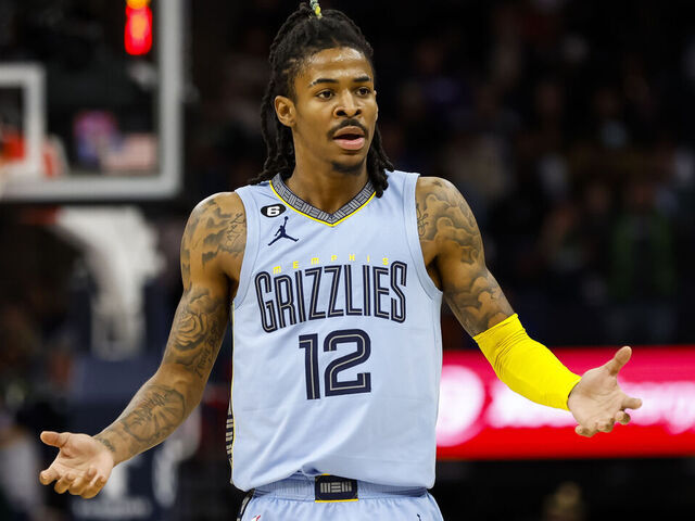 MINNEAPOLIS, MN - NOVEMBER 30: Ja Morant #12 of the Memphis Grizzlies reacts to a call on the floor in the second quarter of the game against the Memphis Grizzlies at Target Center on November 30, 2022 in Minneapolis, Minnesota.