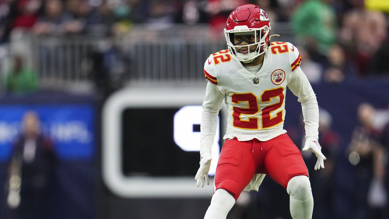 HOUSTON, TX - DECEMBER 18: Juan Thornhill #22 of the Kansas City Chiefs defends against the Houston Texans at NRG Stadium on December 18, 2022 in Houston, Texas.