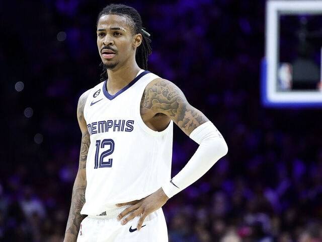 PHILADELPHIA, PENNSYLVANIA - FEBRUARY 23: Ja Morant #12 of the Memphis Grizzlies looks on during the third quarter against the Philadelphia 76ers at Wells Fargo Center on February 23, 2023 in Philadelphia, Pennsylvania.