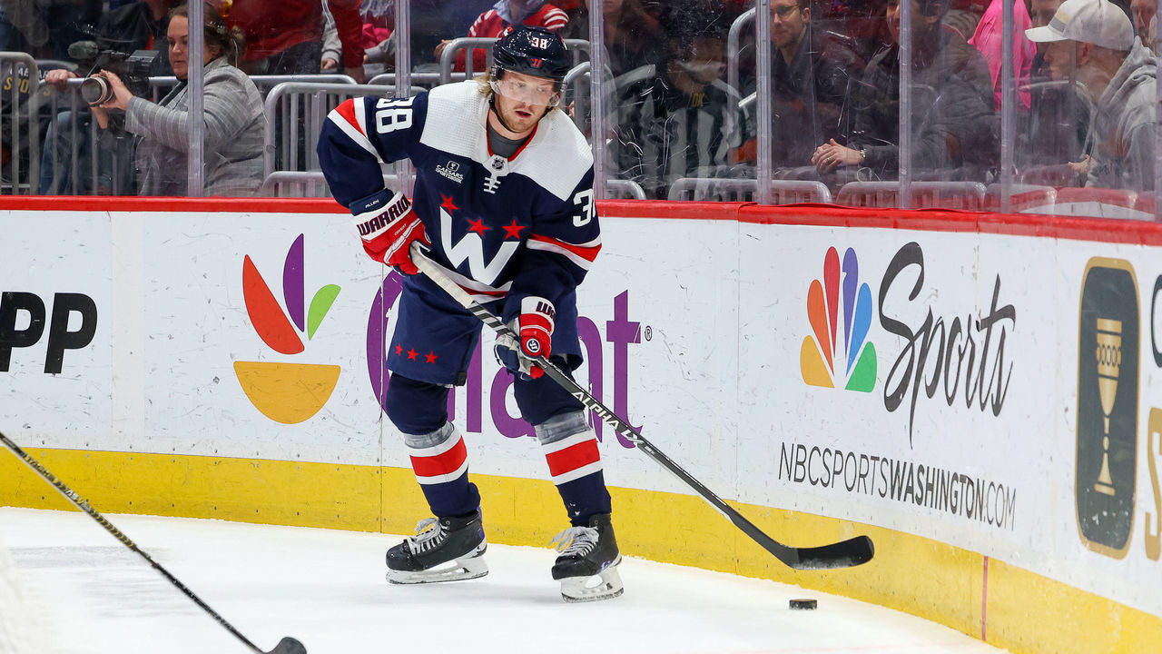 WASHINGTON, DC - MARCH 15: Rasmus Sandin #38 of the Washington Capitals plays the puck during a game against the Buffalo Sabres at Capital One Arena on March 15, 2023 in Washington, D.C.