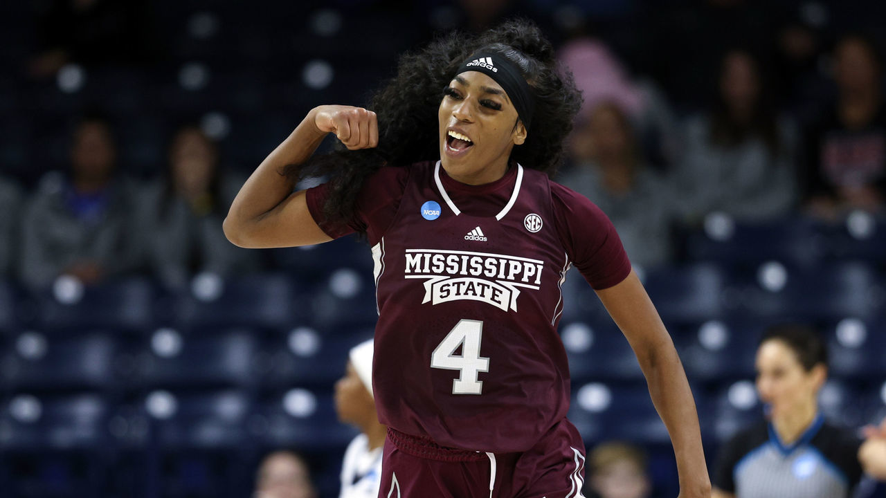 SOUTH BEND, IN - MARCH 15: Jessika Carter #4 of the Mississippi State Bulldogs celebrates on the court after scoring some points against the Illinois Fighting Illini during the First Four round of the 2023 NCAA Women's Basketball Tournament held at Purcell Pavilion on March 15, 2023 in South Bend, Indiana.